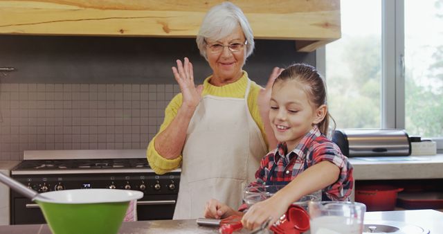 Grandmother Enjoying Baking Cookies with Granddaughter at Home - Download Free Stock Images Pikwizard.com