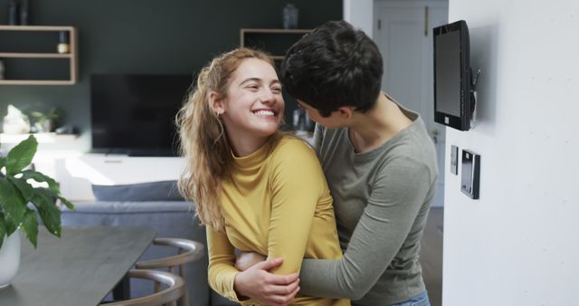 Loving Couple Embracing in Modern Living Room - Download Free Stock Images Pikwizard.com