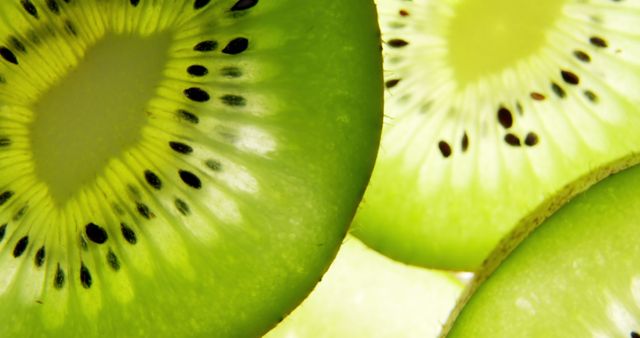 Close-up of Fresh Green Kiwi Slices with Seeds - Download Free Stock Photos Pikwizard.com