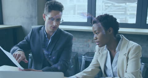 Diverse Business Professionals Analyzing Data with Augmented Reality Interface