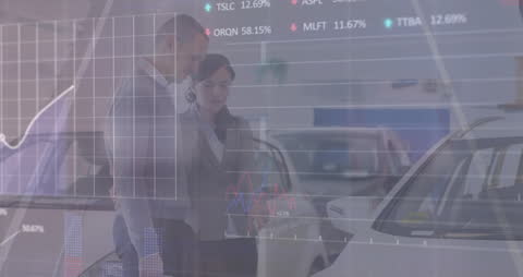 Couple Analyzing Financial Data in Modern Car Showroom