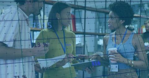 Diverse Team Collaborates in Modern Corporate Office