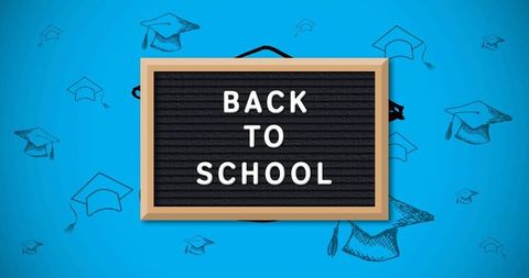 Back to school concept with graduation caps and blue background