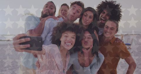 Diverse Friends Celebrating Independence Day at the Beach