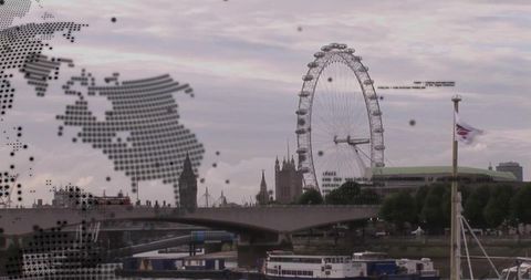 London eye skyline with river thames bridge riverfront ferris wheel and moored boats