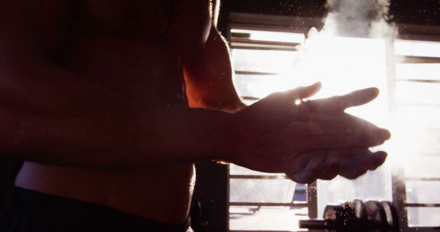 Athlete Preparing Workout with Chalk Dust Gym Light - Download Free Stock Images Pikwizard.com