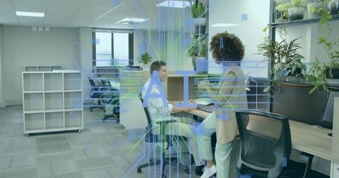 Professional Coworkers Collaborating in Modern Open-Plan Office