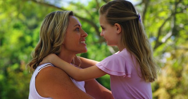 Mother and Daughter Bonding Outdoors on a Sunny Day - Download Free Stock Images Pikwizard.com