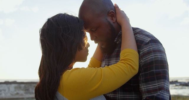 Young couple embracing each other on a sunny day. Couple head to head 4k