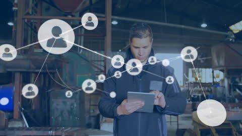 Man Using Tablet in Industrial Environment with Networking Graphics