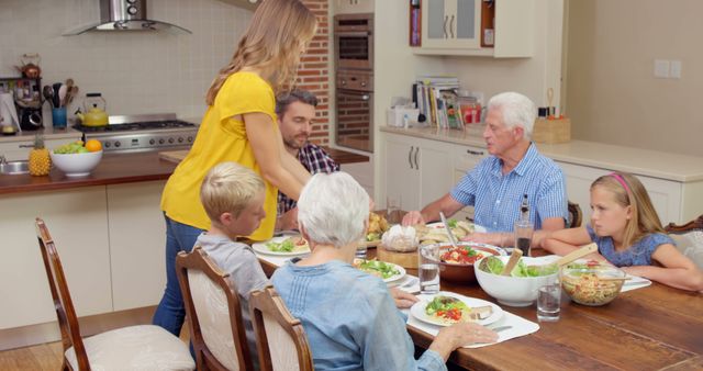 Multigenerational Family Enjoying Dinner at Home - Download Free Stock Images Pikwizard.com