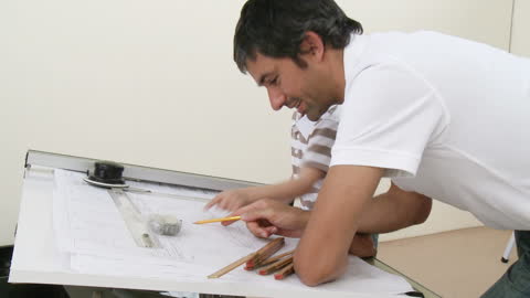 Father and Son Learning Architecture Together at Home