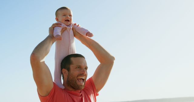 Happy Father Lifting Smiling Baby Outdoor, Sunny Day, Family Fun - Download Free Stock Images Pikwizard.com