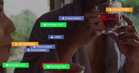 Cozy couple in robes sipping herbal tea with floating social media notifications