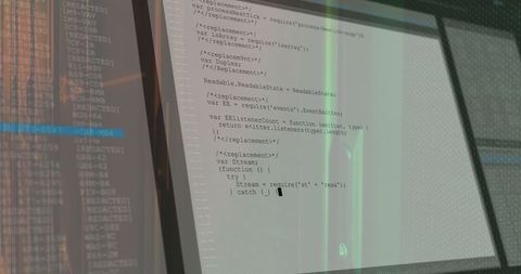 Dual monitors displaying javascript code in modern office