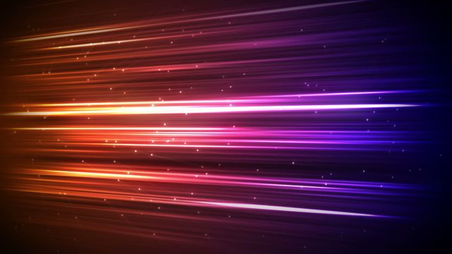 Colorful digital light streaks, with predominant orange, pink, and purple hues and sparkling effects on a dark background. Ideal use in tech-themed projects, presentations, backgrounds for innovation topics, and dynamic multimedia designs for a futuristic and energetic feel.