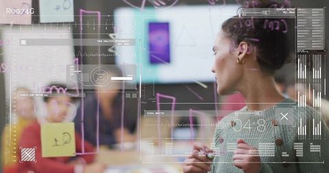 Presenting Woman Gesturing at Glass Wall with Sticky Notes and Digital Data Overlay