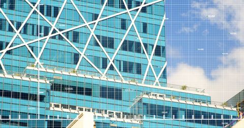 Financial Data Overlay on Modern Skyscraper Background