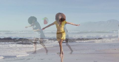 Woman Dancing on Sandy Beach With Vibrant Energy at Ocean Shore
