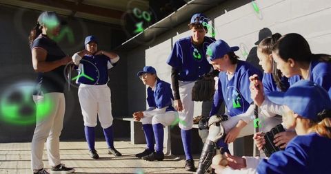 Dynamic softball team and coach strategizing in dugout