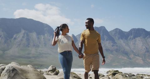 Couple Strolling on Scenic Beach Expedition - Download Free Stock Images Pikwizard.com