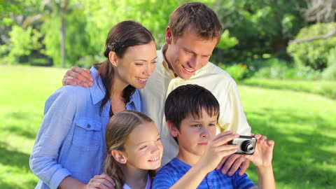 Joyful Family Enjoying Time in Countryside