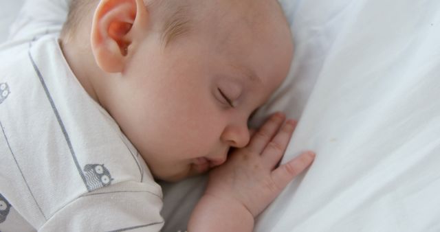 Peaceful Baby Sleeping on White Bed - Download Free Stock Images Pikwizard.com