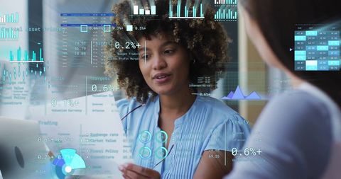 Diverse Professionals Analyzing Financial Data with Digital Overlay