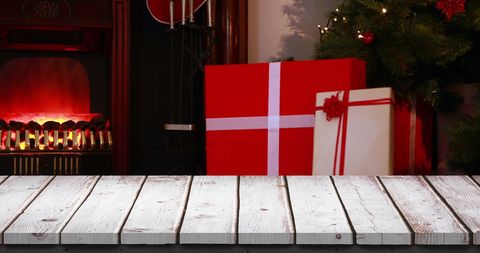 Festive Background with Christmas Gifts by the Fireplace
