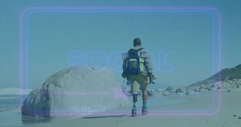 Exploring sandy beach with prosthetic leg and adventure gear