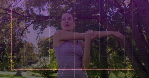 Woman stretching in park with wearable fitness data overlay and line graph