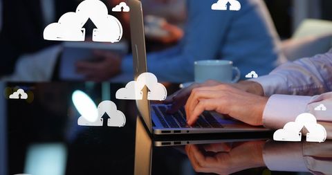 Businessman Typing with Cloud Computing Graphics Overlay - Download Free Stock Images Pikwizard.com