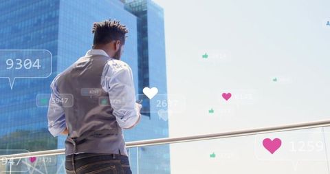 Professional on urban terrace holding smartphone showing floating social media engagement icons