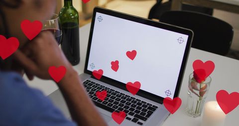 Man enjoying valentine’s day celebration online with wine