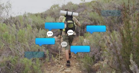 Hiker trekking uphill with virtual chat bubbles concept