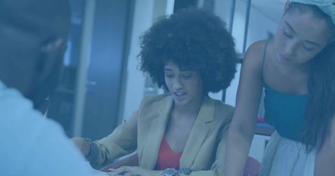 Team reviewing documents in modern office focused female leader collaborating colleagues