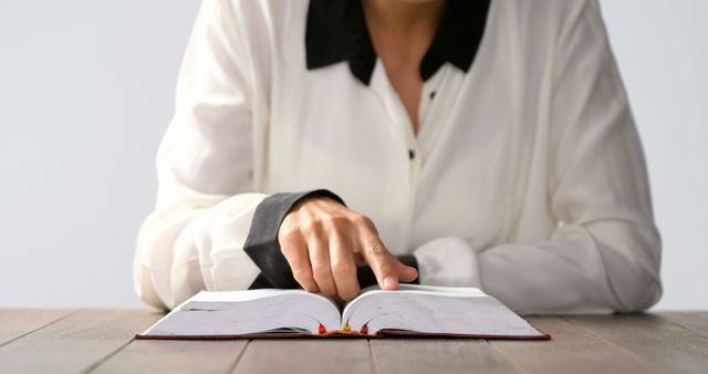 Person Reading Book at Wooden Table - Download Free Stock Images Pikwizard.com