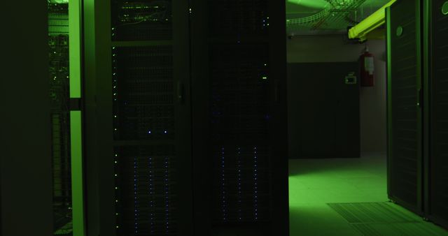 Green control lights flashing with data processing on computer servers in tech room - Download Free Stock Photos Pikwizard.com