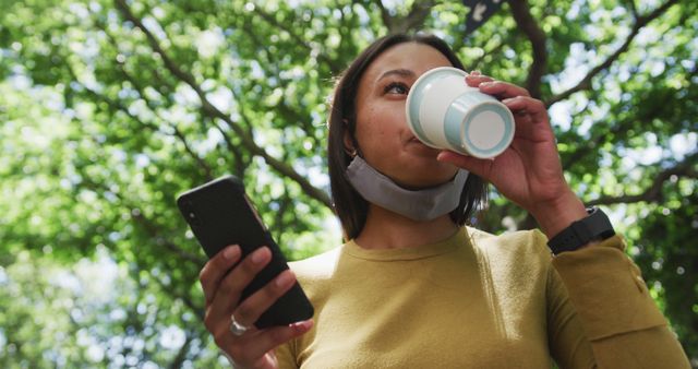 Woman Enjoying Coffee Break Outdoors Using Smartphone - Download Free Stock Images Pikwizard.com