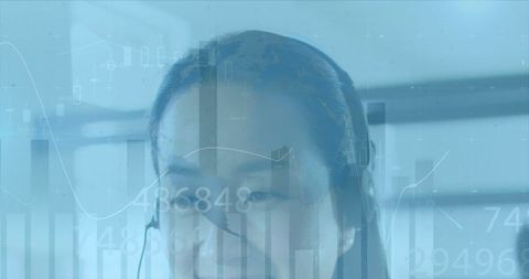 Businesswoman Analyzing Global Financial Data with Headset