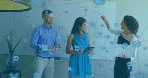 Dynamic Team Collaborating on Innovative Whiteboard Solutions at Modern Office