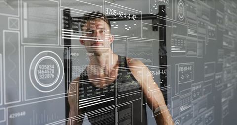 Fit man interacting with holographic fitness dashboard, using AR analytics for training