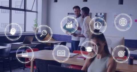 Collaborating in modern coworking workspace with digital AR icons and productivity focus