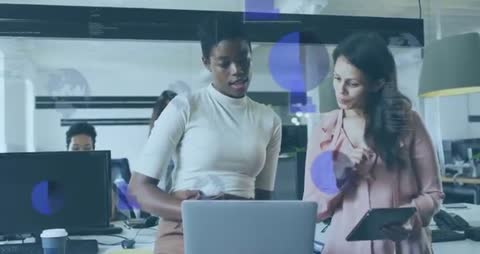 Collaborative Tech Innovation Team Discussing Data in Modern Office