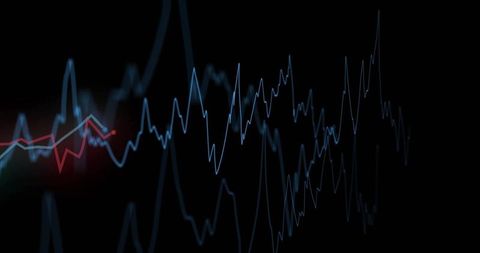 Futuristic Neon Blue and Red Waveforms on Black Background