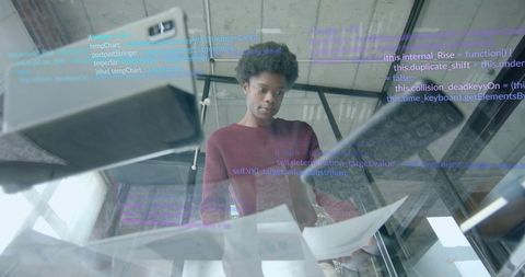 Business Professional Analyzing Digital Data Streams in Modern Office