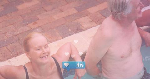 Smiling Senior Couple Relaxing in Backyard Pool with Social Media Interaction