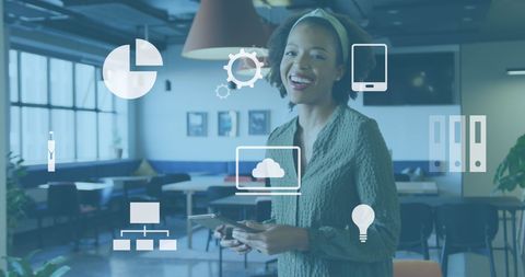 Smiling Businesswoman With Digital Icons in Modern Office - Download Free Stock Images Pikwizard.com