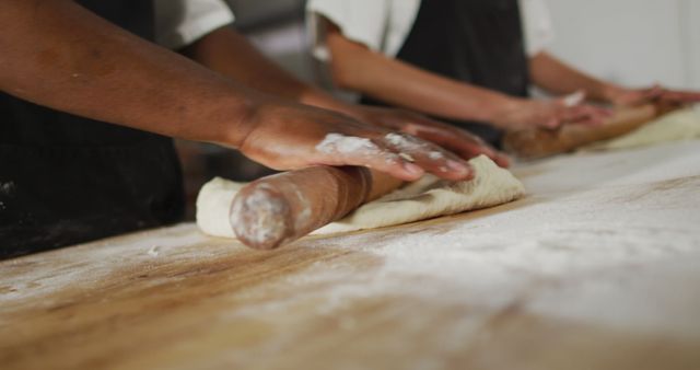 Bakers Rolling Dough in Kitchen - Download Free Stock Images Pikwizard.com