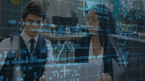 Business Colleagues Analyzing Data with Digital Code Overlay